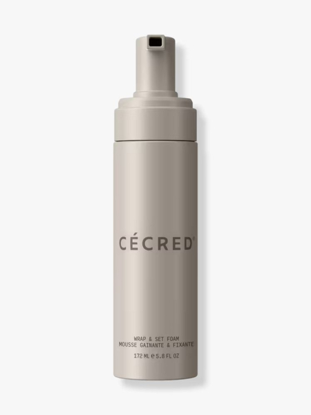 Cécred Wrap & Set Foam greige bottle of setting foam on light gray background